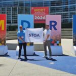 STOA marca presença em evento global de seguros